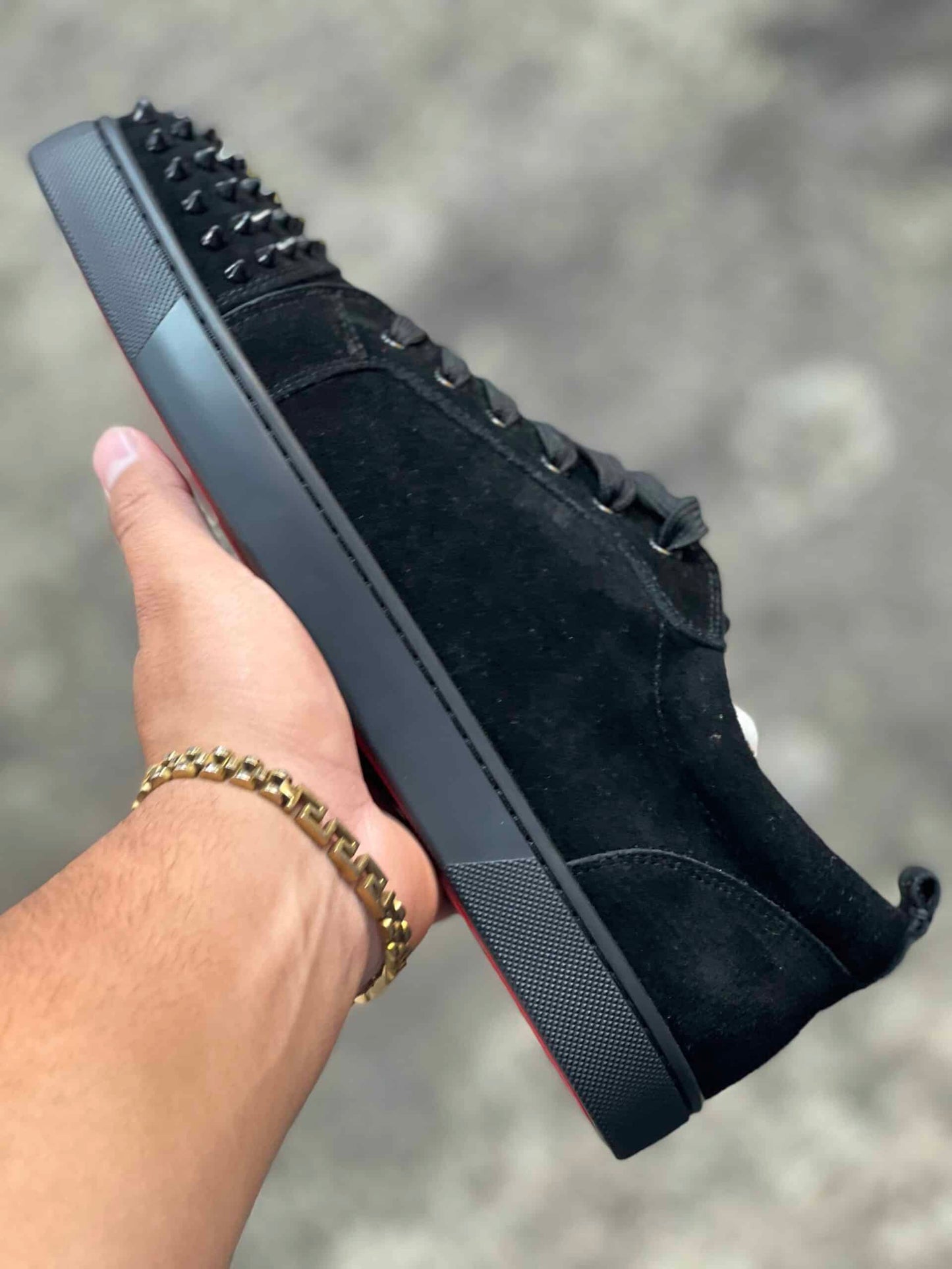 Louboutin (suela roja) (diseñador)