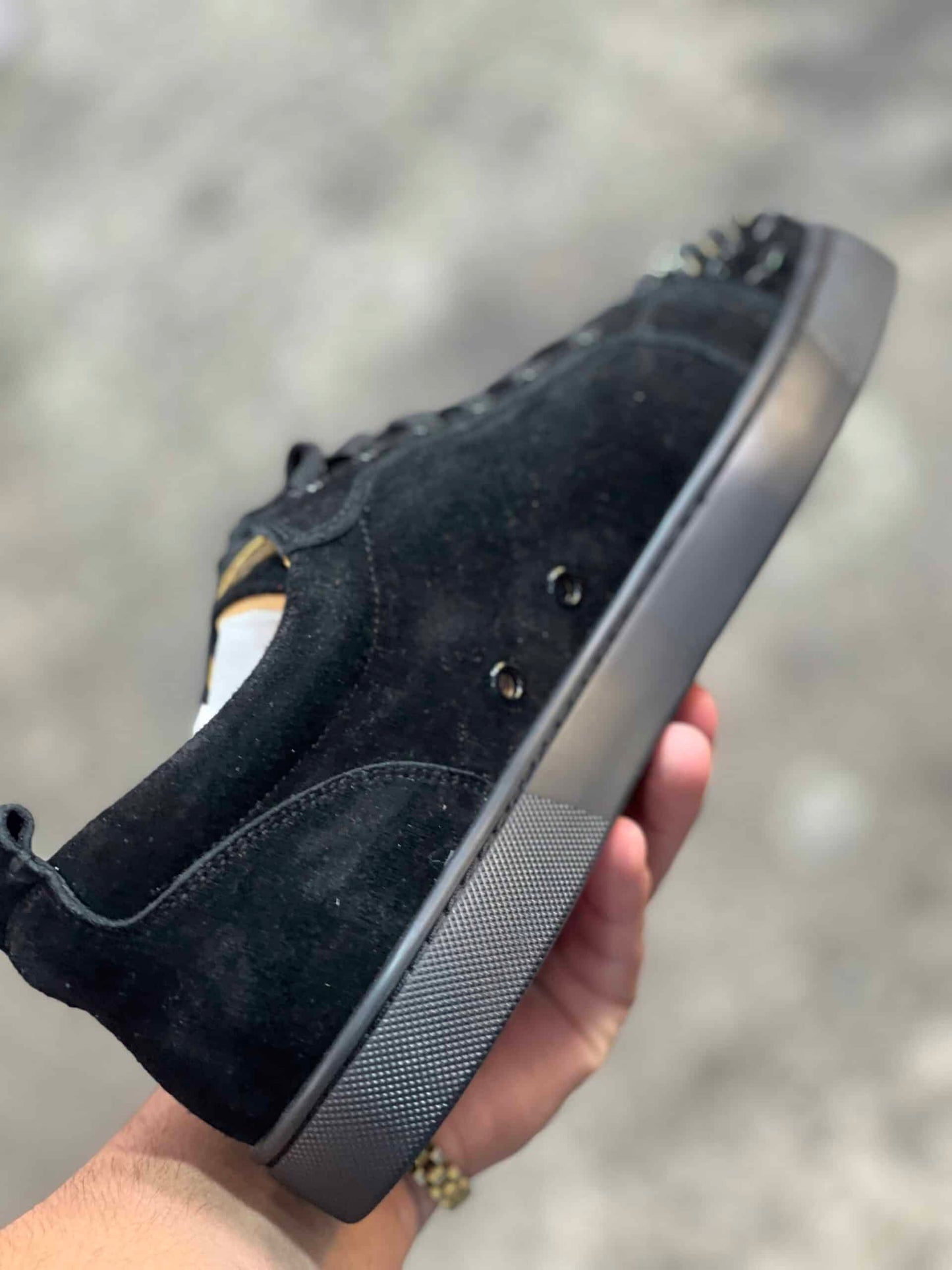 Louboutin (suela roja) (diseñador)