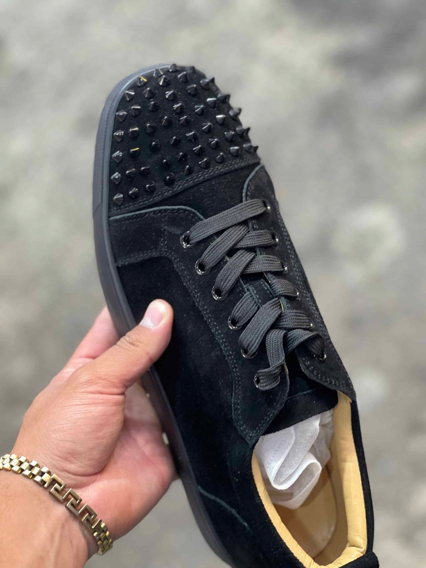 Louboutin (suela roja) (diseñador)