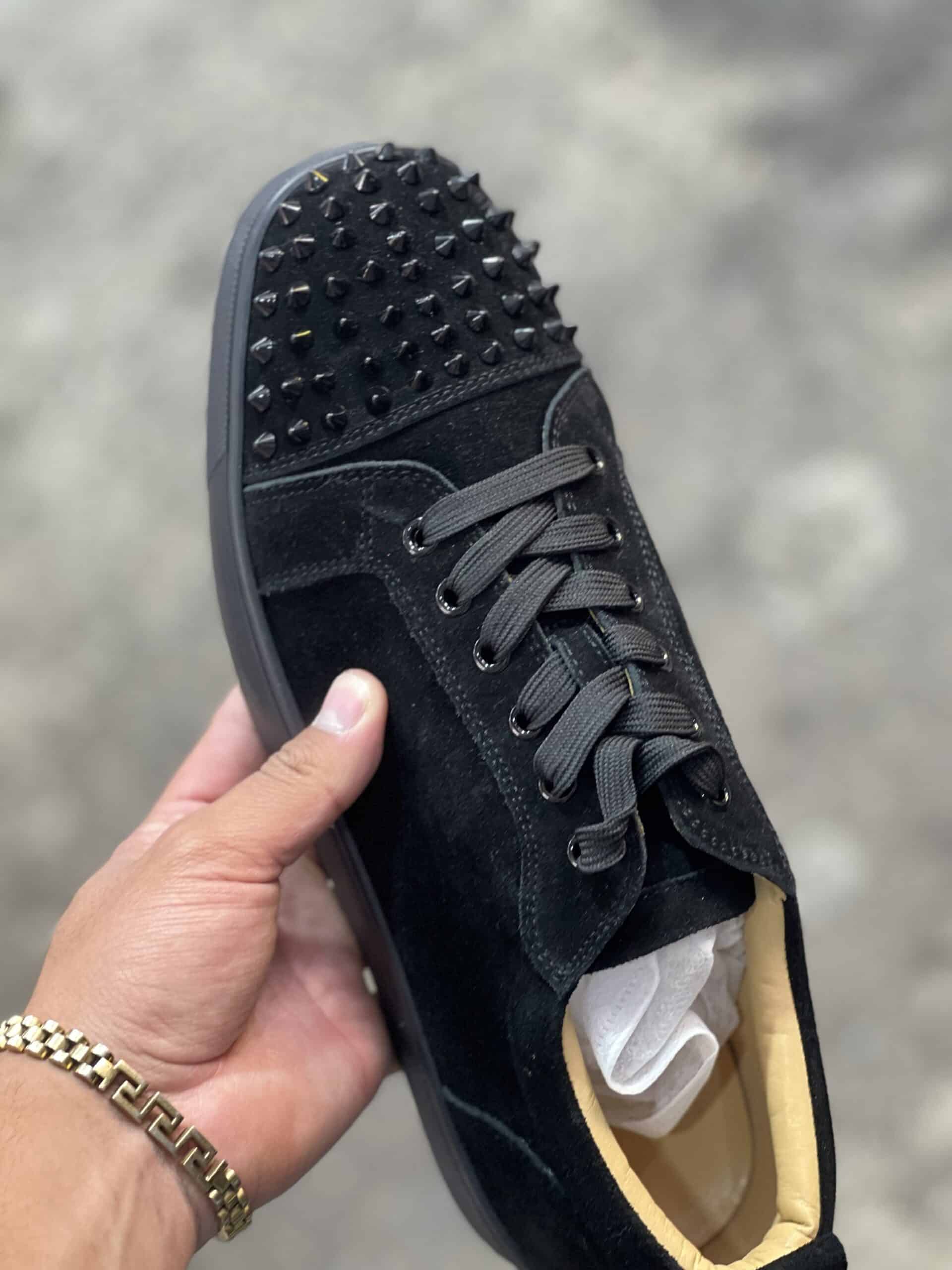 Louboutin (suela roja) (diseñador)